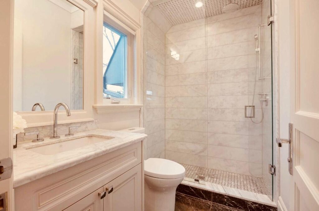 Etobicoke bathroom renovation with walk-in glass shower and custom vanity