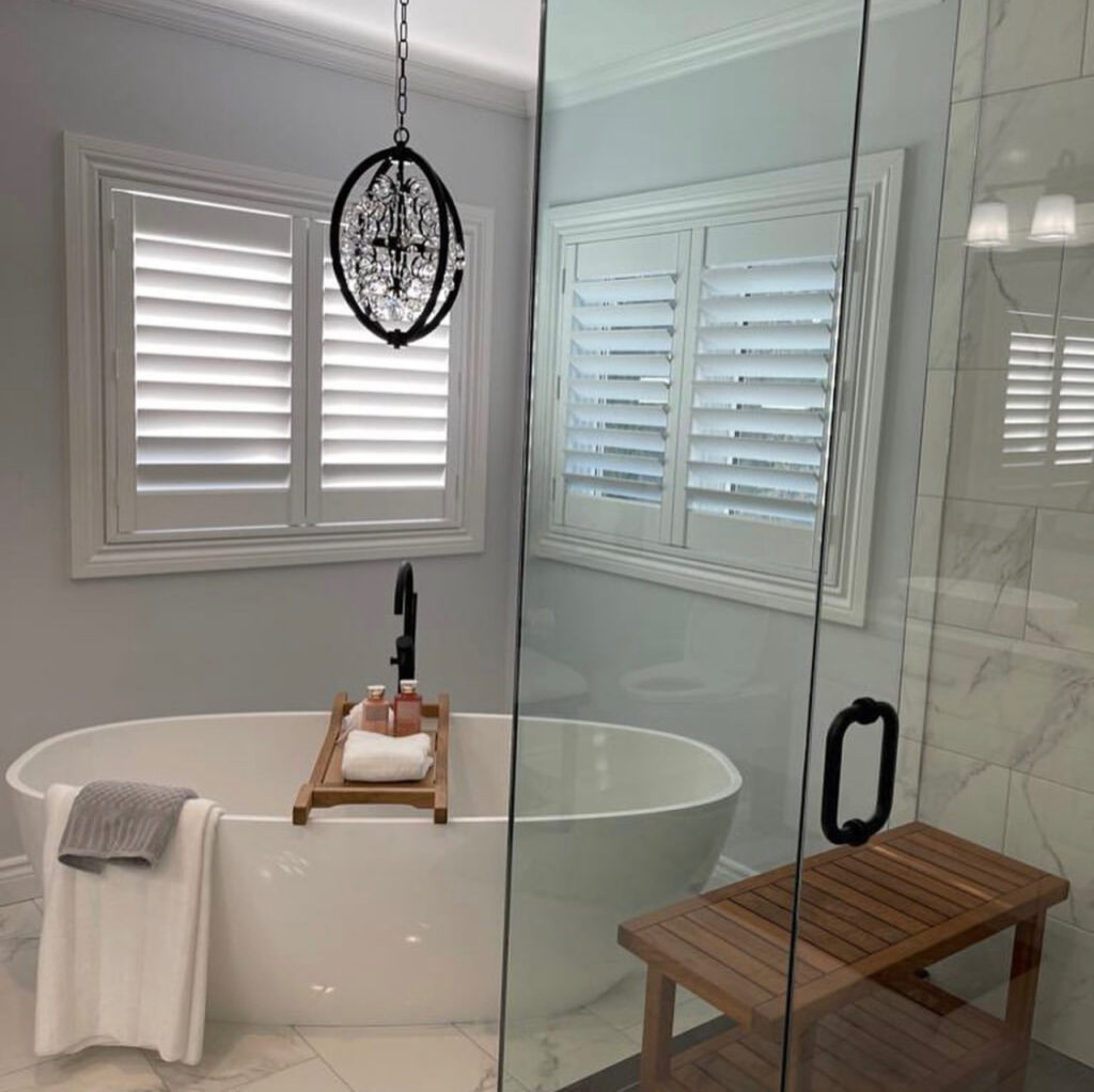 luxury bathroom remodel in Richmond Hill with vanity, mirror, and lighting