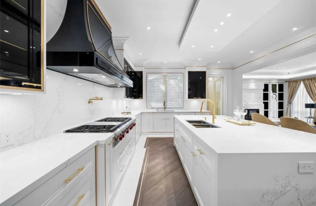 Home addition kitchen extension in Toronto and the GTA with custom cabinetry, luxury finishes, and modern lighting
