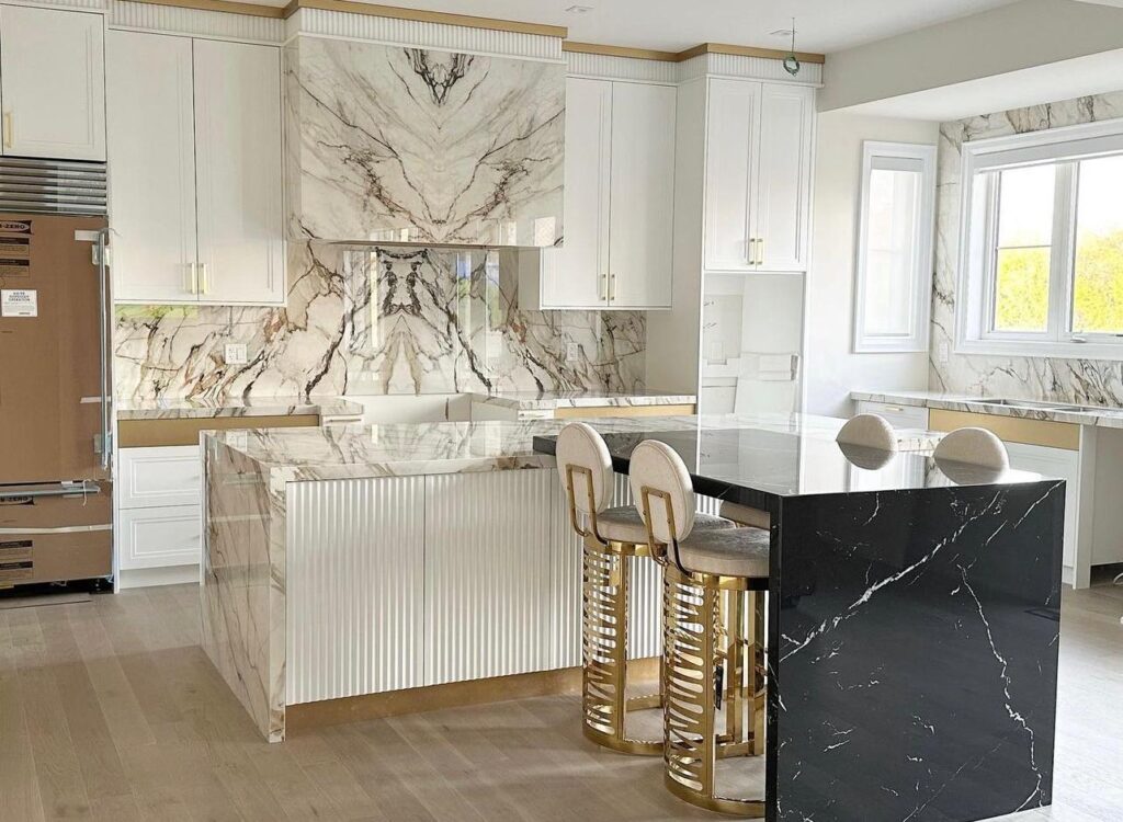 Luxury kitchen renovation in the GTA with marble island, custom cabinets, and high-end finishes